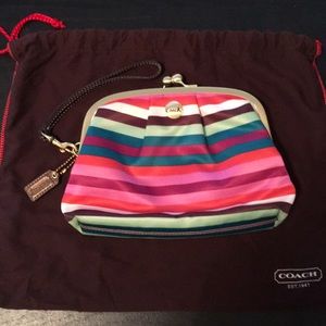 Striped Coach wristlet/clutch